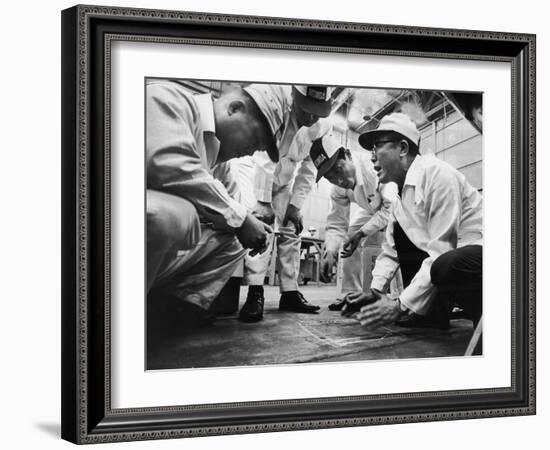 Soichiro Honda Showing Engineers Solution to Body Noise Problem at Research Facility, Japan, 1967-Takeyoshi Tanuma-Framed Photographic Print