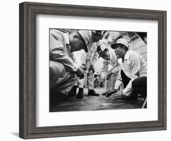 Soichiro Honda Showing Engineers Solution to Body Noise Problem at Research Facility, Japan, 1967-Takeyoshi Tanuma-Framed Photographic Print