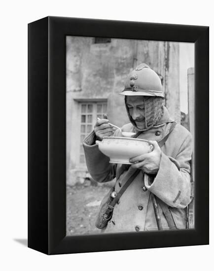 Soldier Eating Soup, 1915-Jacques Moreau-Framed Premier Image Canvas