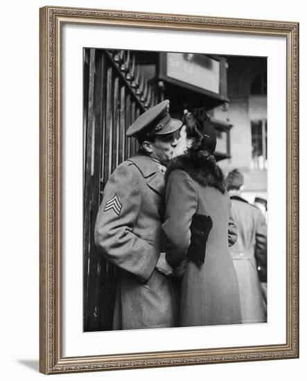 Soldier Kissing His Girlfriend While Saying Goodbye in Pennsylvania Station-Alfred Eisenstaedt-Framed Photographic Print