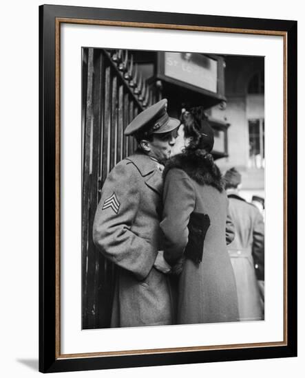 Soldier Kissing His Girlfriend While Saying Goodbye in Pennsylvania Station-Alfred Eisenstaedt-Framed Photographic Print