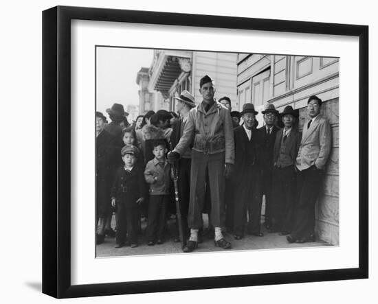 Soldier Standing Guard of Japanese American Citizens Awaiting Transport to Relocation Camps-Dorothea Lange-Framed Photographic Print