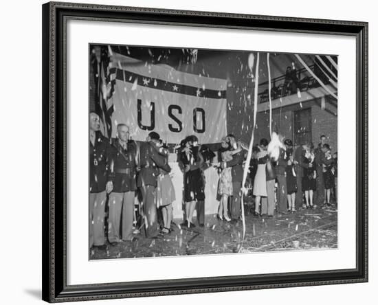 Soldiers Kissing their Brides after Being Married in a Mass Ceremony-null-Framed Photographic Print