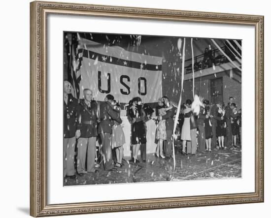 Soldiers Kissing their Brides after Being Married in a Mass Ceremony-null-Framed Photographic Print