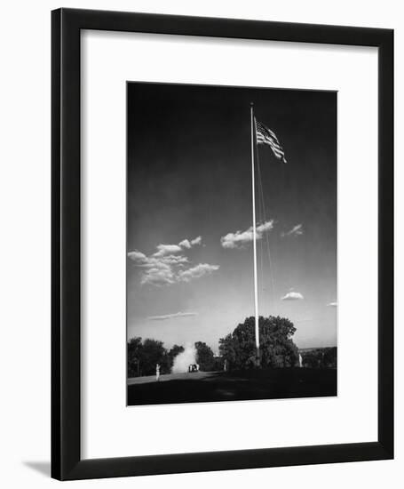 Soldiers Lowering American Flag-Charles E^ Steinheimer-Framed Photographic Print