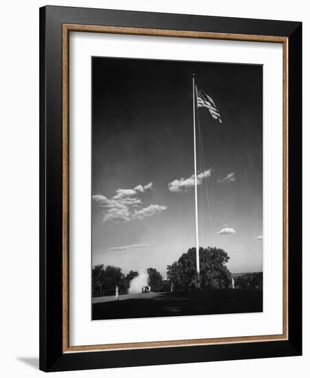 Soldiers Lowering American Flag-Charles E^ Steinheimer-Framed Photographic Print