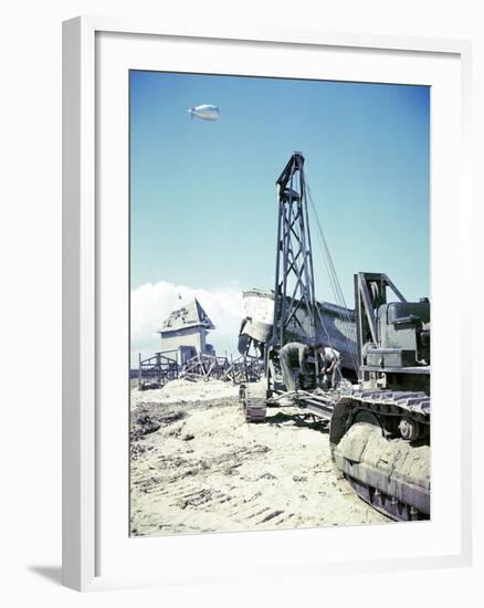 Soldiers of the Corps of Royal Canadian Engineers Cleaning Up on Juno Beach-null-Framed Photographic Print