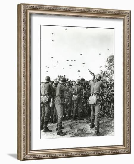 Soldiers Shooting at Enemy Parachuting into Field-null-Framed Photo