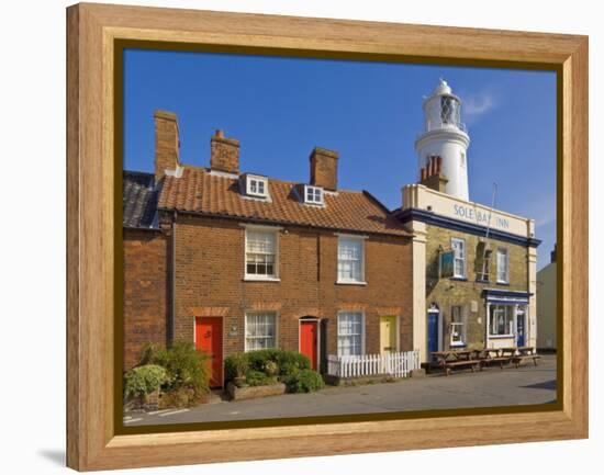 Sole Bay Inn Pub with Southwold Lighthouse Behind, Southwold, Suffolk, England, United Kingdom-Neale Clark-Framed Premier Image Canvas