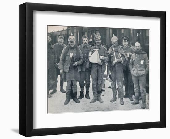 Some cheerful wounded from the Neuve Chapelle fighting, wearing captured German helmets, 1915-Unknown-Framed Photographic Print