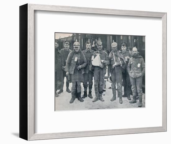 Some cheerful wounded from the Neuve Chapelle fighting, wearing captured German helmets, 1915-Unknown-Framed Photographic Print