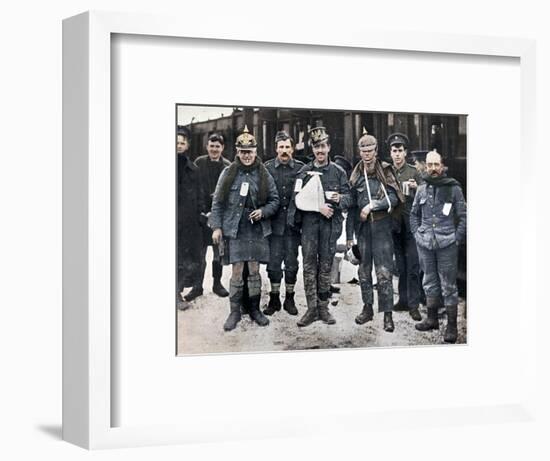 Some cheerful wounded from the Neuve Chapelle fighting, wearing captured German helmets, 1915-Unknown-Framed Photographic Print