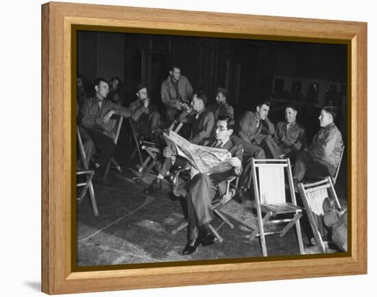 Songwriter Irving Berlin Reading Newspaper as Others Sit around Talking-null-Framed Premier Image Canvas