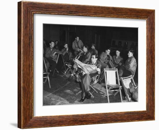 Songwriter Irving Berlin Reading Newspaper as Others Sit around Talking-null-Framed Photographic Print