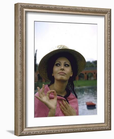 Sophia Loren Wearing a Pink Wrap and Straw Hat Out by the Pool at the Villa-Alfred Eisenstaedt-Framed Premium Photographic Print