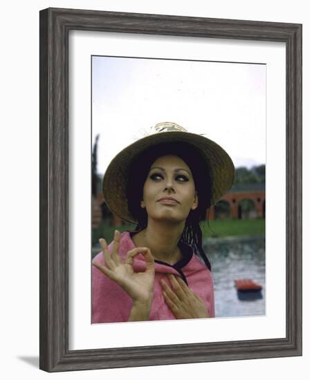 Sophia Loren Wearing a Pink Wrap and Straw Hat Out by the Pool at the Villa-Alfred Eisenstaedt-Framed Premium Photographic Print