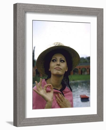 Sophia Loren Wearing a Pink Wrap and Straw Hat Out by the Pool at the Villa-Alfred Eisenstaedt-Framed Premium Photographic Print