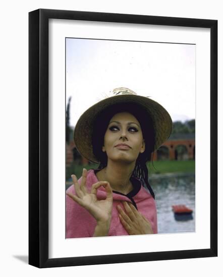 Sophia Loren Wearing a Pink Wrap and Straw Hat Out by the Pool at the Villa-Alfred Eisenstaedt-Framed Premium Photographic Print