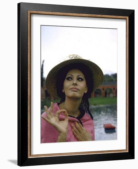 Sophia Loren Wearing a Pink Wrap and Straw Hat Out by the Pool at the Villa-Alfred Eisenstaedt-Framed Premium Photographic Print