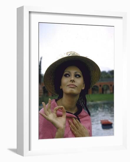 Sophia Loren Wearing a Pink Wrap and Straw Hat Out by the Pool at the Villa-Alfred Eisenstaedt-Framed Premium Photographic Print