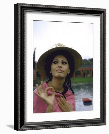 Sophia Loren Wearing a Pink Wrap and Straw Hat Out by the Pool at the Villa-Alfred Eisenstaedt-Framed Premium Photographic Print