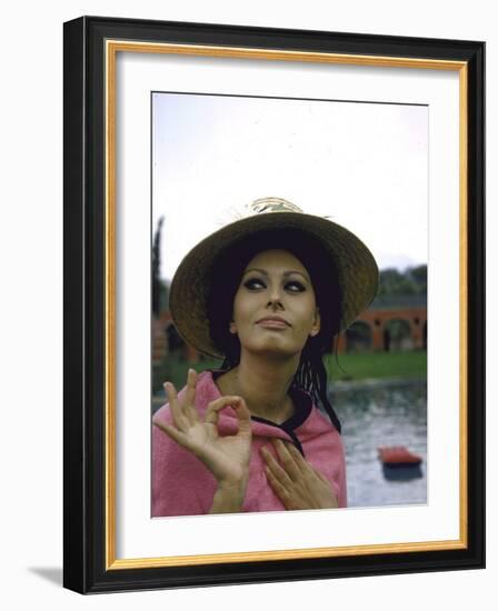 Sophia Loren Wearing a Pink Wrap and Straw Hat Out by the Pool at the Villa-Alfred Eisenstaedt-Framed Premium Photographic Print