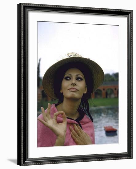 Sophia Loren Wearing a Pink Wrap and Straw Hat Out by the Pool at the Villa-Alfred Eisenstaedt-Framed Premium Photographic Print