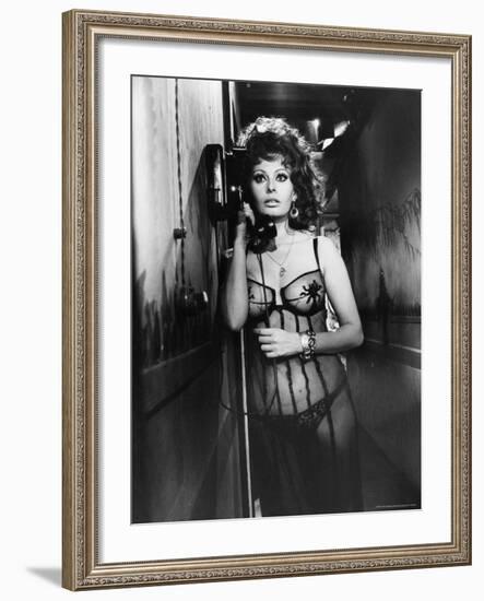 Sophia Loren Wearing Costume, Talking on Telephone During Scene in "Marriage, Italian Style"-Alfred Eisenstaedt-Framed Premium Photographic Print