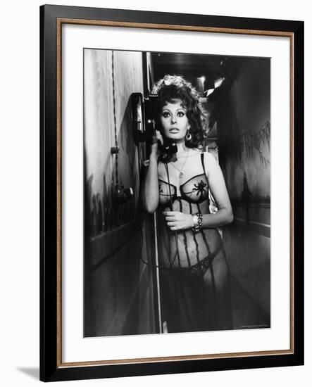 Sophia Loren Wearing Costume, Talking on Telephone During Scene in "Marriage, Italian Style"-Alfred Eisenstaedt-Framed Premium Photographic Print