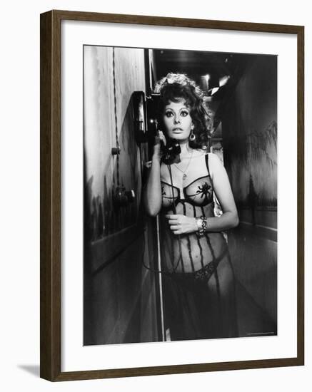 Sophia Loren Wearing Costume, Talking on Telephone During Scene in "Marriage, Italian Style"-Alfred Eisenstaedt-Framed Premium Photographic Print