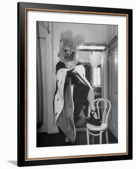 Soprano Patrice Munsel Costumed as Notary for Cosi Fan Tutte, Pulling onGloves in Dressing Room-Peter Stackpole-Framed Premium Photographic Print