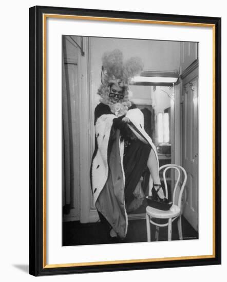 Soprano Patrice Munsel Costumed as Notary for Cosi Fan Tutte, Pulling onGloves in Dressing Room-Peter Stackpole-Framed Premium Photographic Print