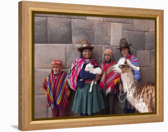 South America, Peru, Cusco. Quechua People in Front of An Inca Wall, Holding a Lamb and a Llama-Alex Robinson-Framed Premier Image Canvas