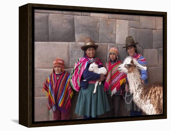 South America, Peru, Cusco. Quechua People in Front of An Inca Wall, Holding a Lamb and a Llama-Alex Robinson-Framed Premier Image Canvas