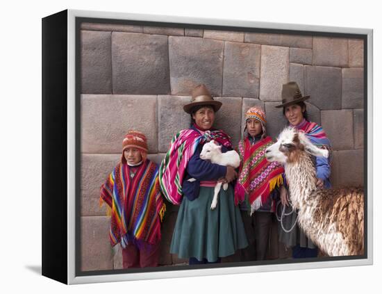 South America, Peru, Cusco. Quechua People in Front of An Inca Wall, Holding a Lamb and a Llama-Alex Robinson-Framed Premier Image Canvas