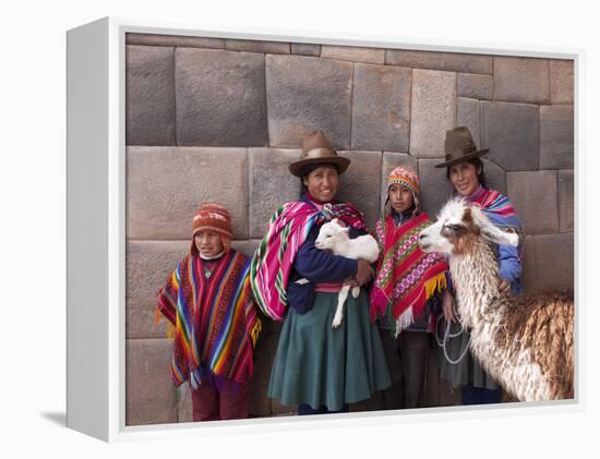 South America, Peru, Cusco. Quechua People in Front of An Inca Wall, Holding a Lamb and a Llama-Alex Robinson-Framed Premier Image Canvas