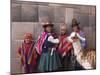 South America, Peru, Cusco. Quechua People in Front of An Inca Wall, Holding a Lamb and a Llama-Alex Robinson-Mounted Photographic Print