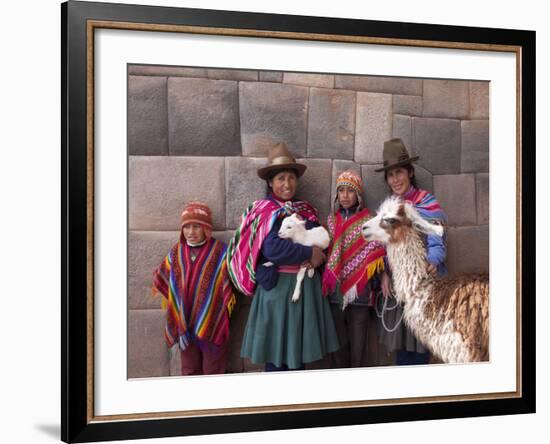 South America, Peru, Cusco. Quechua People in Front of An Inca Wall, Holding a Lamb and a Llama-Alex Robinson-Framed Photographic Print