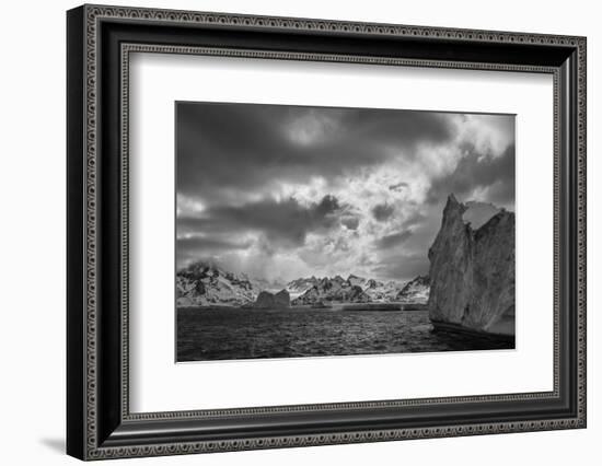 South Georgia Island. Black and white Landscape of iceberg floating and mountain scenery.-Howie Garber-Framed Photographic Print