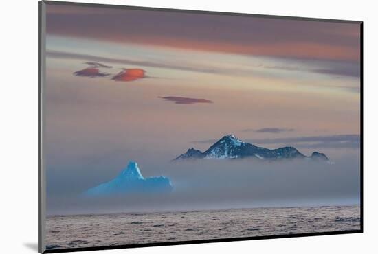 South Georgia Island. Cooper Island and Blue Iceberg rise out of the fog.-Howie Garber-Mounted Photographic Print