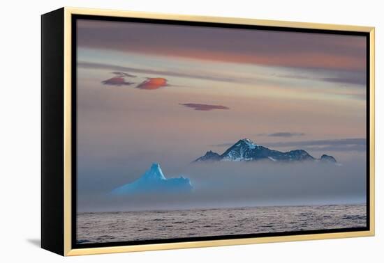 South Georgia Island. Cooper Island and Blue Iceberg rise out of the fog.-Howie Garber-Framed Premier Image Canvas