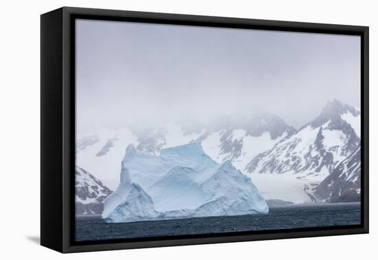 South Georgia Island. Large Iceberg Floats Past Mountains-Jaynes Gallery-Framed Premier Image Canvas