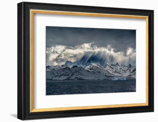 South Georgia Island. Opening in clouds and Virga reveal the mountainous and glaciated landscape.-Howie Garber-Framed Photographic Print