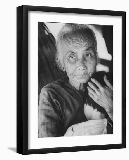 South Vietnamese Refugee Holding Small Child-Carl Mydans-Framed Photographic Print