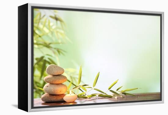 Spa Still Life with Stacked of Stone,Burning Candle and Bamboo Leaf-Liang Zhang-Framed Premier Image Canvas