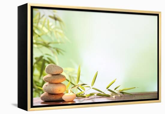 Spa Still Life with Stacked of Stone,Burning Candle and Bamboo Leaf-Liang Zhang-Framed Premier Image Canvas