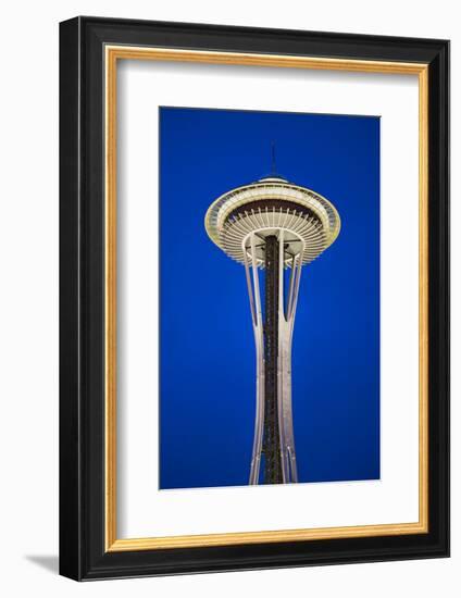 Space Needle in Seattle, Washington at dusk in deep blue sky; it is a major landmark and a symbo...-null-Framed Photographic Print