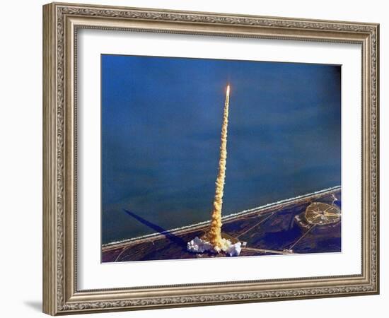 Space Shuttle Columbia on a Pillar of Exhaust as it Begins its Ten-Day Mission on Oct 22, 1992-null-Framed Photo