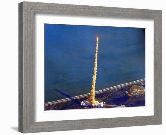 Space Shuttle Columbia on a Pillar of Exhaust as it Begins its Ten-Day Mission on Oct 22, 1992-null-Framed Photo