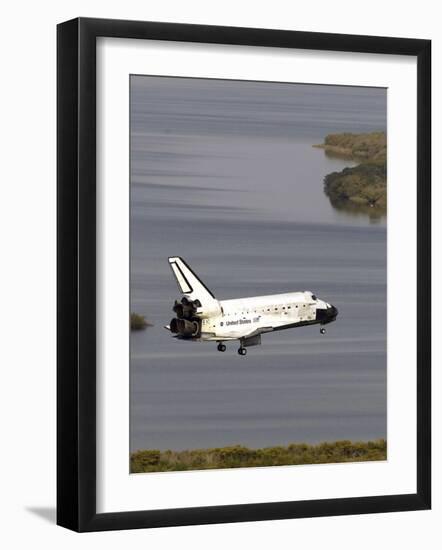 Space Shuttle Discovery Glides over the Banana River to a Landing on Kennedy Space Center's Runway-null-Framed Photographic Print